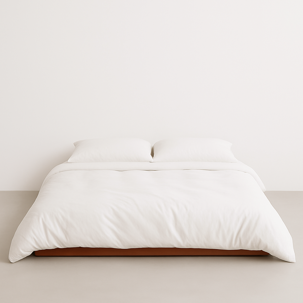 White Bamboo Bedding on a wooden bed frame with a neutral background